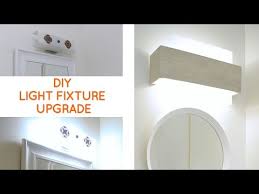 Inspect to see if any bulbs are burned out if the light sockets are getting power, move on to the next step or you might need to replace the light. Camouflaging A Dated Off Center Bathroom Lighting Fixture I Needed A Quick Inexpensive Bathroom Lighting Bathroom Vanity Lighting Bathroom Remodel Small Diy