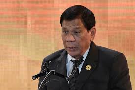 Filipinos rally against president duterte during martial law anniversary. Philippines Duterte Signs Indemnity Bill For Covid 19 Vaccine Rollout Reuters