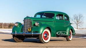 Image result for Mansion Maroon 1938 Oldsmobile