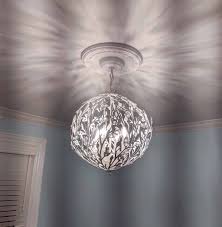 This eye catching 4 light design is the perfect nod toward today's modern aesthetic. Luna Light Fixture White Chandelier Firefly Home Kids Lighting