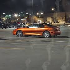 Image result for Sunburst Orange 2004 Pontiac