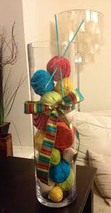 Hand knitting is a form of knitting, in which the knitted fabric is produced by hand using needles. Knitting Party Decor Yarn Balls Knitting Needles Yarn Store Display Ideas Yarn Display Yarn Shop Display