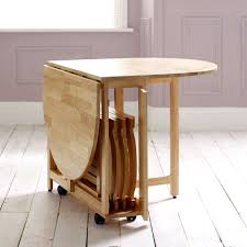Folding nerida trestle dining table. Foldable Dining Room Table