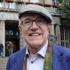 Musiker spielen Blues und die Passion Jesu