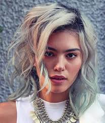The few threads of highlights sparkle in the white background. 20 Gimme The Blues Bold Blue Highlight Hairstyles Latest Hair Colors
