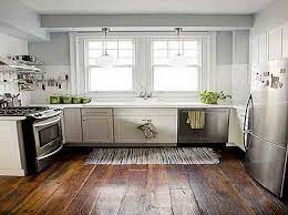 Say good bye to the stark white kitchen and introduce a pop of colour to your home with these colourful kitchen cabinet ideas. Wide Planked Wood Floors Small Kitchen Inspiration Kitchen Remodel Small Kitchen Design Small