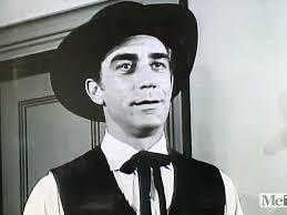 The Rifleman The Most Amazing Man Wade Randall(Sammy Davis Jr.) comes to  town telling yarns about his gun fighting exploits. Lovett (Richard Devon)  calls him out and challenges him to a duel.