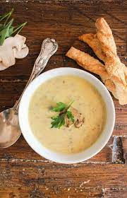 Mushroom soup is a hearty and delicious dish to make on a cold winter night. Creamy Mushroom Soup And Parmesan Bread Twists