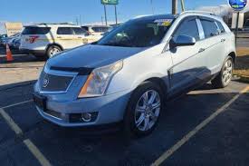 Image result for Glacier Blue 2013 SRX