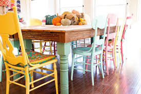 The key to this space's success is its clean, modern look, which prevents the vivid colors from overwhelming the eye. Whatever Friday Friday Dining Room Colors Painted Dining Chairs Home