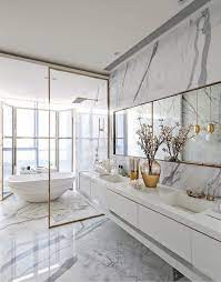 It also balances perfectly with the darker materials of the floor and shower in the space. Striking Marble Bathrooms In Luxury Interiors
