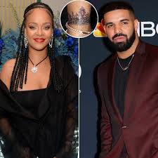 Jun 25, 2021 · rihanna and drake pose onstage during the 2016 mtv video music awards. Rihanna Covers Up Matching Shark Tattoo She Got With Ex Drake