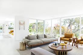 Sofa plus coffee table is such an automatic living room combination, many of us don't even stop to consider the alternatives. Sarah Sherman Samuel Mandy Moore S Family Room Tour