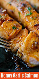 Honey Garlic Salmon In A Skillet With Yummy Honey Garlic Sauce This Salmon Dinner Is So Easy To Make An Baked Salmon Recipes Honey Garlic Salmon Salmon Dishes