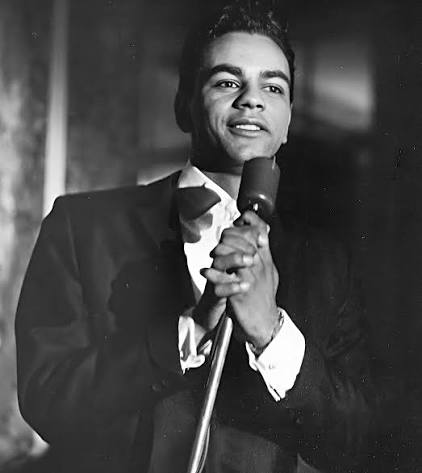 Johnny Mathis flees from Arthur at Columbia Records
