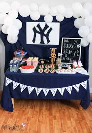 Decorations can include banners, foam fingers, teddy bears dressed as baseball players, balls, and mitts. New York Yankees Shower Table Decor Celebrate Your Little Slugger With This Super Cute New Yo Yankees Birthday Party Yankees Baby Baseball Baby Shower Theme