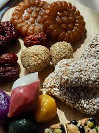 Shaved ice topped with korean glutinous rice cakes coated with a soybean . 23 Korean Desserts Easy Traditional Recipes