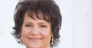 Women in Business: Mackey credits family for success in real estate