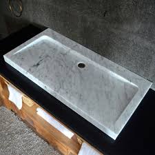 If you're looking for an elegant sink design that can work in a multitude of bathrooms, consider trough bathroom sinks. China Italian Carrara White Marble Stone Bathroom Trough Sink China Vessel Sink Stone Sink