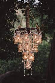 Make A Diy Chandelier Easily With These Ideas Cozy Diy Mason Jar Crafts Diy Mason Jar Diy Mason Jar Chandelier