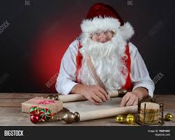 See if you are naughty. Santa Claus Checking Image Photo Free Trial Bigstock