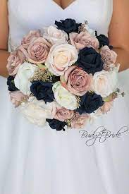 Blush pink and blue are opposite each other on the color wheel, which makes them complementary colors, the effect of the two together is timeless to help you get a perfect pink and navy wedding, i have collected several wonderful ideas, and let's start with these adorable wedding bouquets. Dust Rose Mauve Navy Blue Blush Pink Roses Fake Bridal Bouquet Round Wedding Bouquet Wedding Wedding Bridal Bouquets Fake Wedding Flowers Blue Wedding Flowers