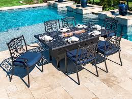 Tables with fire pits in the center. Living Room Milan Aged Bronze Cast Aluminum 7 Pc Dining Set With 84 X 44 In Fire Pit Table