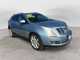 Image result for Glacier Blue 2013 SRX