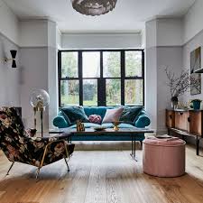 The living room leads to a den/home office, and it is the hardwood floors that unifies these two seemingly different rooms. Living Room Flooring Ideas From Wooden Flooring And Tiles To Carpet