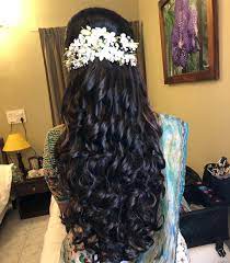 Aruna S Reception Makeover For An Enchanting Look On Your D Day Please Feel Free Bridal Hairstyle Indian Wedding Indian Wedding Hairstyles Bridal Hairdo