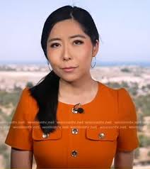 WornOnTV: Selina Wang's orange button front sheath dress