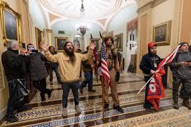 Adam Johnson, who allegedly stole Pelosi's lecturn, Jake Angeli charged in Capitol riots - The Washington Post