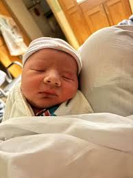 What could be causing swelling under my 5-week-old baby boy's penis after  circumcision?