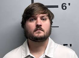 Federal charges against former Rogers teacher and coach unsealed