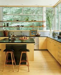 If you're not ready for a complete cabinet overhaul, consider a fresh coat of paint on lower cabinets or highlight an island with a different color. 75 Beautiful Yellow Kitchen With Light Wood Cabinets Pictures Ideas June 2021 Houzz