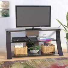 This tv mount is a chic solution with white finish and white tempered glass shelving that will complement any decor. Tinted Glass Tv Stand Wayfair
