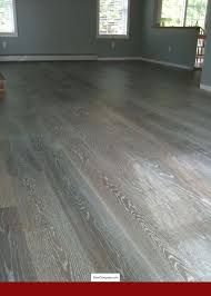 Wood Floor Rug Ideas Grey Laminate Flooring Pics And Pics Of Living Room Flooring Singapore Tip 25365649 Grey Hardwood Floors Grey Hardwood House Flooring