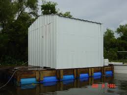 Read these posts on the development of this design. Building A Barrel Barge