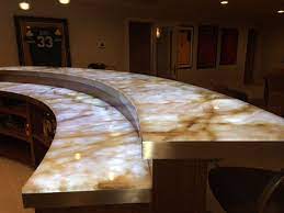 I Hadn T Really Heard About Backlighting Stone Until Recently But Am Now Super Interested Hav Basement Bar Designs Onyx Countertops Natural Stone Countertops