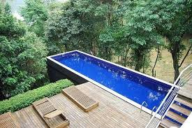 This is a great pool area, raised and lined with stylish brick. Small Yard Small Pool 25 Tiny Pools Intheswim Pool Blog