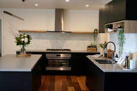 Matt Black Kitchen With Timber Shelf Detailing Caesarstone Sleek Concrete Benchtops And Herr Simple Kitchen Design White Wood Kitchens Interior Design Kitchen