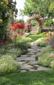 When Designing Your Garden Plan To Use Just 4 5 Types Of Flowers To Make A Simple Elegant Place To Enjoy Th Garden Inspiration Garden Walkway Cottage Garden