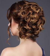 These bridesmaid curls are swept to the side. 20 Incredibly Stunning Diy Updos For Curly Hair