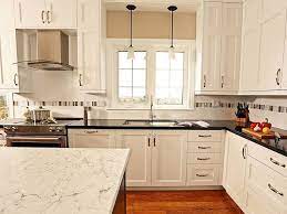 De fazio tiles and stone on instagram: The Veining Of Our New Color White Attica Pairs Perfectly With The Dark Perimeter Countertops Kingsmill Kitchens Kitchen Remodel Kitchen Slab Kitchen Flooring