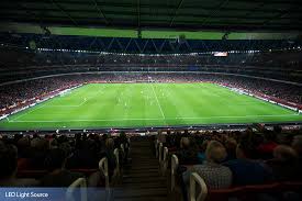 The polycarbonate roof allows as much natural light as possible to be used for illumination. Emirates Stadium Arsenal Fussball Club Musco