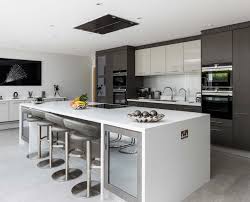 The idea that kitchen cabinets can help lumina in scots grey gloss with sutton in heather slate and milano levante marble worktops. Modern Grey Kitchen With Show Stopping Island Stoneham Kitchens
