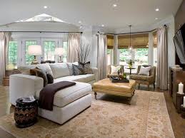 Candice Olsen Combined Sleek Chairs In A Classic Paisley Print With A Traditional Tufted Ottoman I Best Living Room Design Family Room Design Livingroom Layout