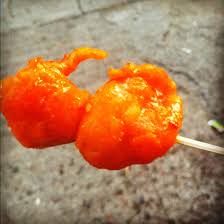 Kwek Kwek A Famous Filipino Street Food Made With Quail Eggs Coated With Orange Batter Deep Fried And Skewered On A S Filipino Street Food Food Fried Quail