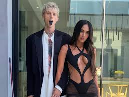 Megan Fox and Machine Gun Kelly drink each others blood to celebrate  engagement