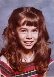 Just wondering if any of you amazingly talented folks can clear up this  very old, somewhat blurry now, photo for me. It is me, left, at age 35 (now  82) and my